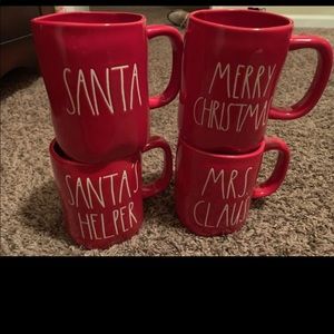 Three excluding Santa Helper Rae Dunn Mugs
